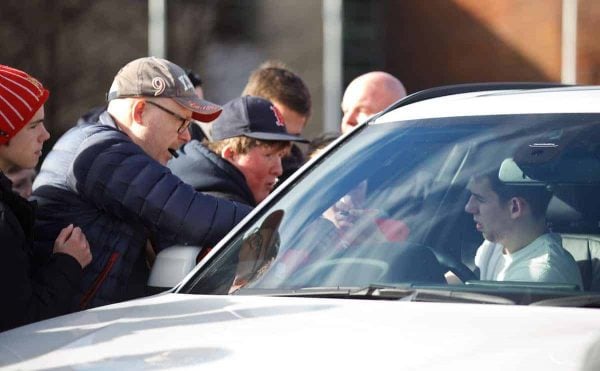 LIVERPOOL, ENGLAND - Wednesday, February 18, 2015: Liverpool's Jon Flanagan signs autographs for supporters as he leaves the training ground ahead of the UEFA Europa League Round of 32 1st leg match against Besiktas JK at Melwood Training Ground. (Pic by David Rawcliffe/Propaganda)