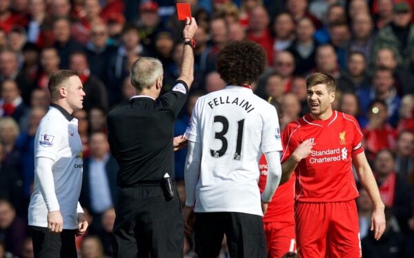 LIVERPOOL, ENGLAND - Sunday, March 22, 2015: Liverpool's captain Steven Gerrard reacts after being fouled by Manchester United's Ander Herrera, but is amazingly shown the red card by referee Martin Atkinson during the Premier League match at Anfield. (Pic by David Rawcliffe/Propaganda)