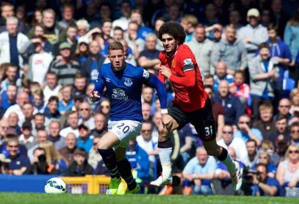 LIVERPOOL, ENGLAND - Sunday, April 26, 2015: Everton's Ross Barkley in action against Manchester United's Marouane Fellaini during the Premier League match at Goodison Park. (Pic by David Rawcliffe/Propaganda)