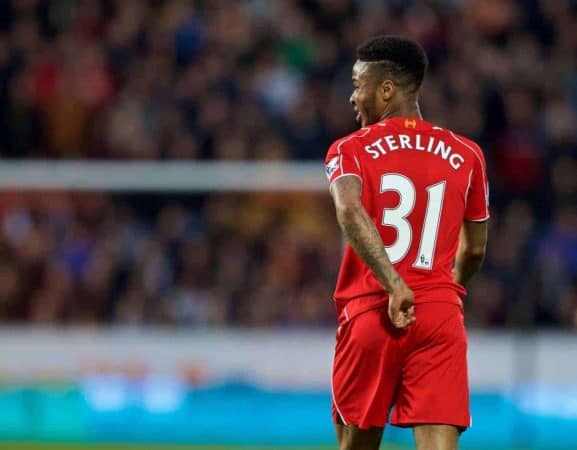 KINGSTON-UPON-HULL, ENGLAND - Tuesday, April 28, 2015: Liverpool's Raheem Sterling feels a pain in his back against Hull City during the Premier League match at the KC Stadium. (Pic by Gareth Jones/Propaganda)