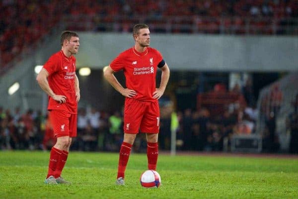 KUALA LUMPUR, MALAYSIA - Friday, July 24, 2015: Liverpool's James Milner and captain Jordan Henderson in action against a Malaysia XI during a friendly match at the Bukit Jalil National Stadium on day twelve of the club's preseason tour. (Pic by David Rawcliffe/Propaganda)