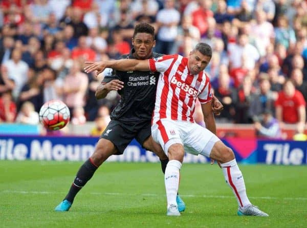 STOKE-ON-TRENT, ENGLAND - Sunday, August 9, 2015: Liverpool's Joe Gomez in action against Stoke City's Jonathan Walters during the Premier League match at the Britannia Stadium. (Pic by David Rawcliffe/Propaganda)