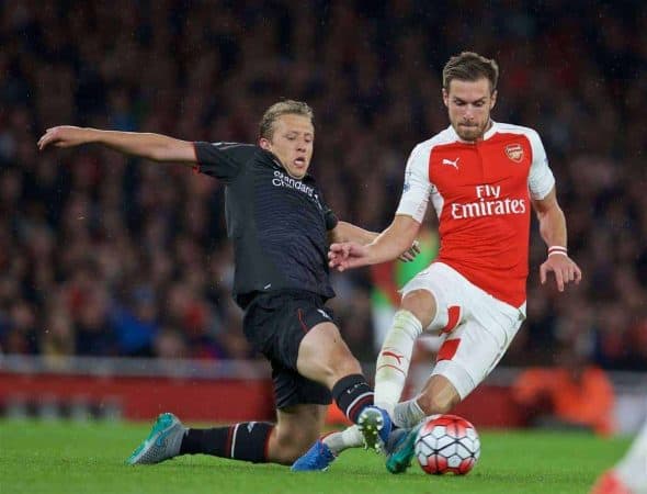 LONDON, ENGLAND - Monday, August 24, 2015: Liverpool's Lucas Leiva tackles Arsenal's Aaron Ramsey during the Premier League match at the Emirates Stadium. (Pic by David Rawcliffe/Propaganda)