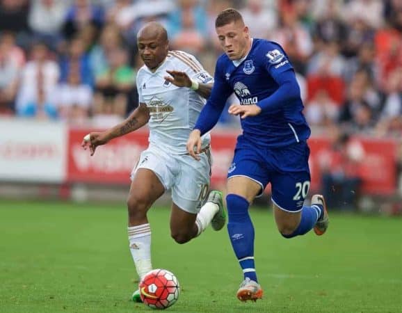 SWANSEA, WALES - Saturday, September 19, 2015: Everton's Ross Barkley in action against Swansea City's Andre Ayew during the Premier League match at the Liberty Stadium. (Pic by David Rawcliffe/Propaganda)