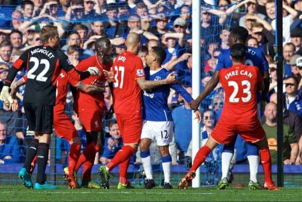 LIVERPOOL, ENGLAND - Sunday, October 4, 2015: Liverpool's Mamadou Sakho and Everton's Romelu Lukaku are separated by team-mates after a clash during the Premier League match at Goodison Park, the 225th Merseyside Derby. (Pic by David Rawcliffe/Propaganda)