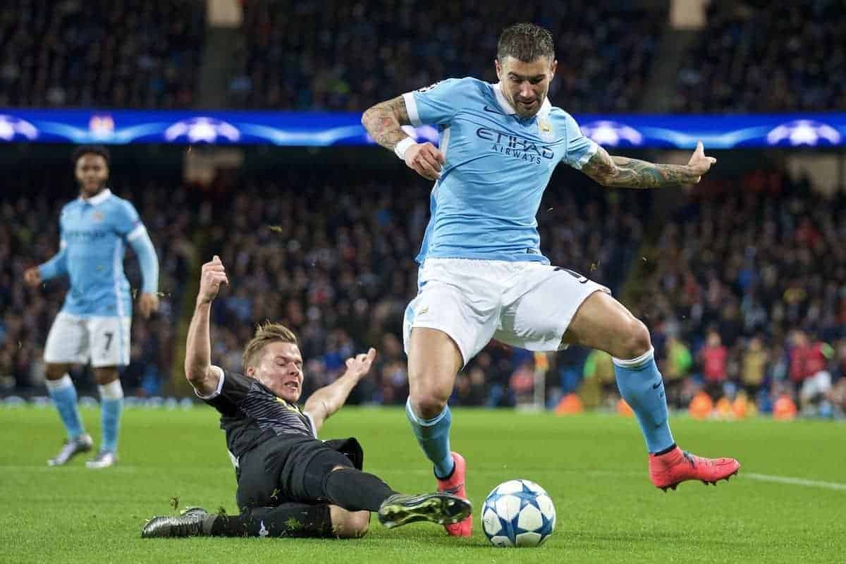 MANCHESTER, ENGLAND - Tuesday, December 8, 2015: Manchester City's Aleksandar Kolarov is tackled by VfL Borussia Mönchengladbach's Nico Elvedi during the UEFA Champions League Group D match at the City of Manchester Stadium. (Pic by David Rawcliffe/Propaganda)