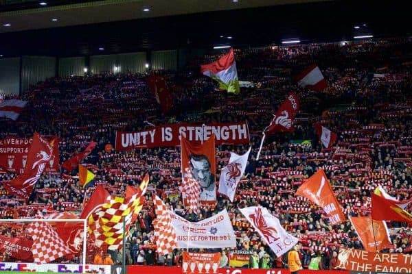 LIVERPOOL, ENGLAND - Thursday, March 10, 2016: Liverpool supporters on the Spion Kop with banners "Unity is Strength" and "We Told You They Lied, Justice for the 96" before the UEFA Europa League Round of 16 1st Leg match against Manchester United at Anfield. (Pic by David Rawcliffe/Propaganda)