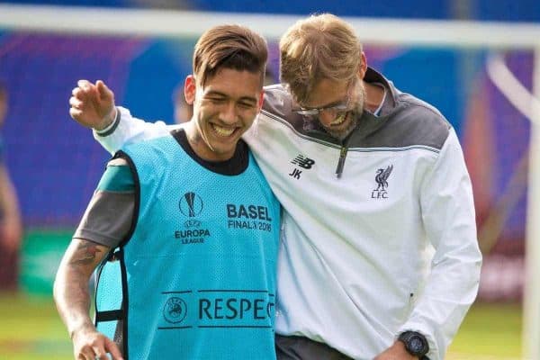 BASEL, SWITZERLAND - Tuesday, May 17, 2016: Liverpool's manager Jürgen Klopp hugs Roberto Firmino after a training session ahead of the UEFA Europa League Final against Sevilla FC at St. Jakob-Park. (Pic by David Rawcliffe/Propaganda)