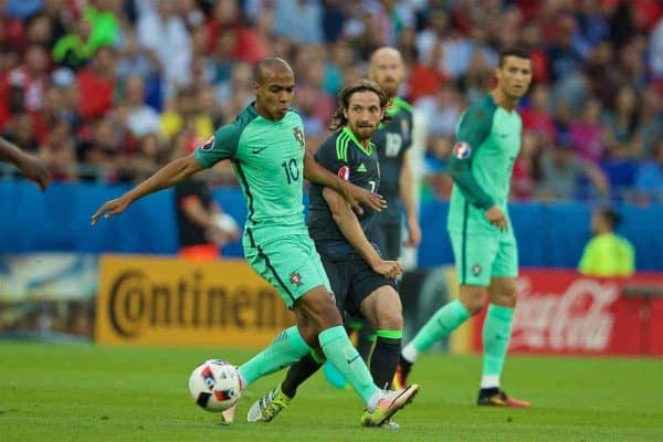 LYON, FRANCE - Wednesday, July 6, 2016: Wales' Joe Allen in action against Portugal's João Mário during the UEFA Euro 2016 Championship Semi-Final match at the Stade de Lyon. (Pic by David Rawcliffe/Propaganda)