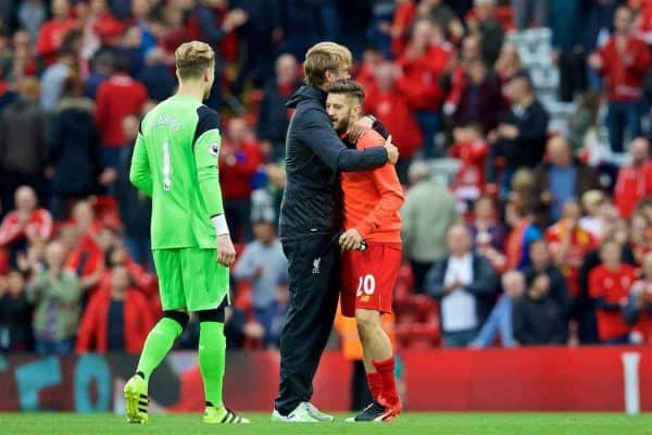 LIVERPOOL, ENGLAND - Saturday, September 24, 2016: Liverpool's manager Jürgen Klopp hugs goalscorer Adam Lallana after the 5-1 victory over Hull City during the FA Premier League match at Anfield. (Pic by David Rawcliffe/Propaganda)