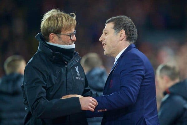 LIVERPOOL, ENGLAND - Sunday, December 11, 2016: Liverpool's manager Jürgen Klopp and West Ham United's manager Slaven Bilic embrace before the FA Premier League match against at Anfield. (Pic by David Rawcliffe/Propaganda)