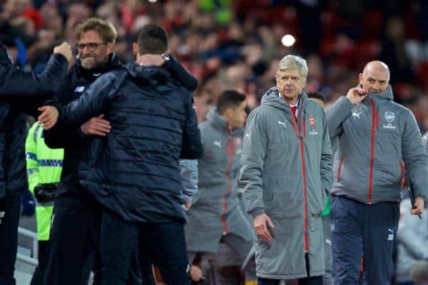 LIVERPOOL, ENGLAND - Saturday, March 4, 2017: Arsenal's manager Arsene Wenger waits to shake hands as Liverpool's manager Jürgen Klopp celebrates the 3-1 victory with his staff during the FA Premier League match at Anfield. (Pic by David Rawcliffe/Propaganda)