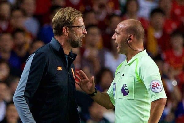 HONG KONG, CHINA - Saturday, July 22, 2017: Liverpool's manager J¸rgen Klopp is spoken to by referee Bobby Madley during the Premier League Asia Trophy final match between Liverpool and Leicester City at the Hong Kong International Stadium. (Pic by David Rawcliffe/Propaganda)