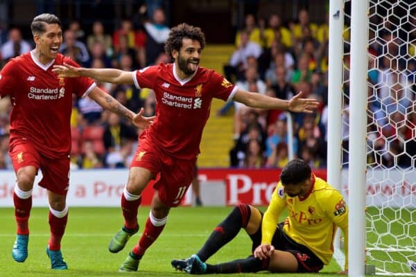 WATFORD, ENGLAND - Saturday, August 12, 2017: Liverpool's Mohamed Salah celebrates scoring the third goal with team-mate Roberto Firmino during the FA Premier League match between Watford and Liverpool at Vicarage Road. (Pic by David Rawcliffe/Propaganda)