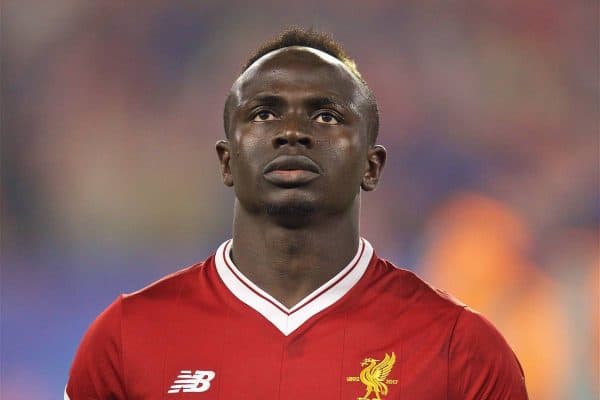 SEVILLE, SPAIN - Tuesday, November 21, 2017: Liverpool's Sadio Mane massages the head of a mascot before the UEFA Champions League Group E match between Sevilla FC and Liverpool FC at the Estadio RamÛn S·nchez Pizju·n. (Pic by David Rawcliffe/Propaganda)