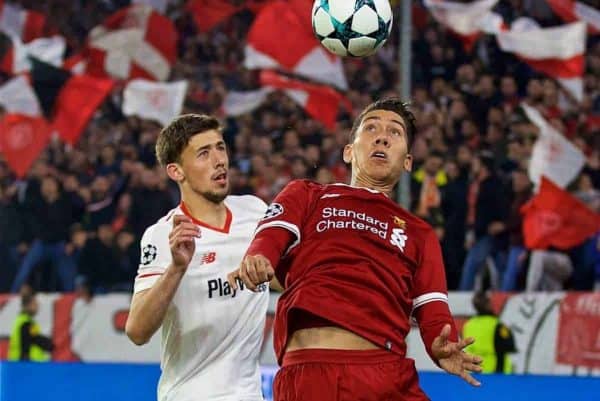 SEVILLE, SPAIN - Tuesday, November 21, 2017: Liverpool's Roberto Firmino and 's ClÈment Lenglet during the UEFA Champions League Group E match between Sevilla FC and Liverpool FC at the Estadio RamÛn S·nchez Pizju·n. (Pic by David Rawcliffe/Propaganda)