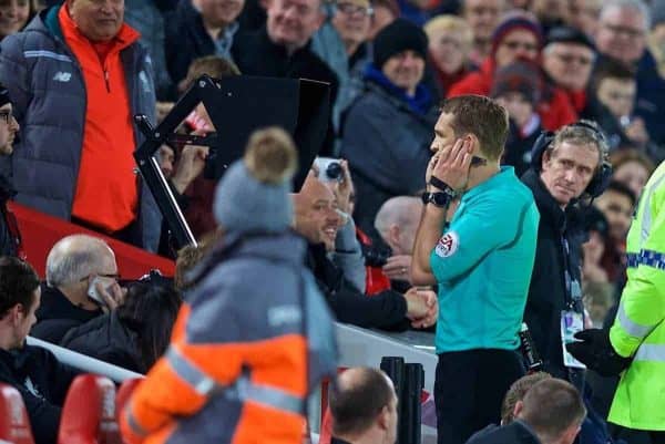 LIVERPOOL, ENGLAND - Sunday, January 14, 2018: Referee Craig Pawson studies a pitch-side television monitor as he reviews a foul before awarding Liverpool a penalty using VAR during the FA Premier League match between Liverpool and Manchester City at Anfield. (Pic by David Rawcliffe/Propaganda)