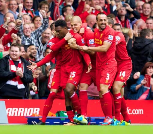 LIVERPOOL, ENGLAND - Sunday, September 1, 2013: Liverpool's Daniel Sturridge celebrates with team-mates Iago Aspas, Martin Skrtel, Jose Enrique and Jordan Henderson after scoring the first goal against Manchester United during the Premiership match at Anfield. (Pic by David Rawcliffe/Propaganda)