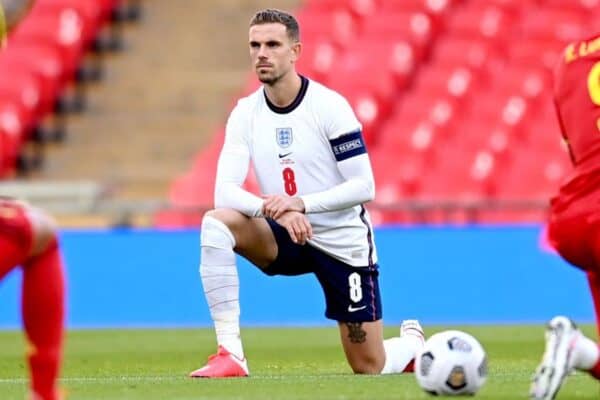 Jordan Henderson take a knee, England