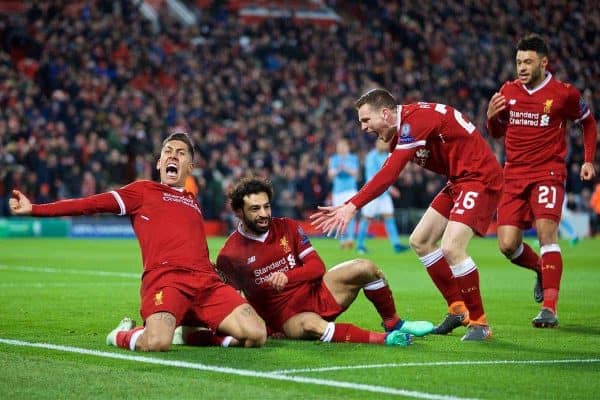 LIVERPOOL, ENGLAND - Wednesday, April 4, 2018: Liverpool's Mohamed Salah celebrates scoring the first goal with team-mates Roberto Firmino and Andy Robertson during the UEFA Champions League Quarter-Final 1st Leg match between Liverpool FC and Manchester City FC at Anfield. (Pic by David Rawcliffe/Propaganda)