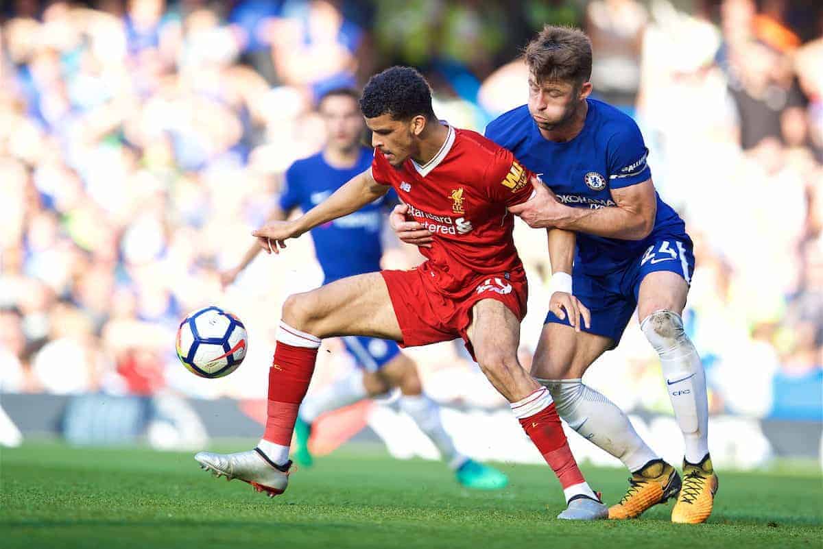 LONDON, ENGLAND - Sunday, May 6, 2018: Liverpool's Dominic Solanke and Chelsea's Gary Cahill during the FA Premier League match between Chelsea FC and Liverpool FC at Stamford Bridge. (Pic by David Rawcliffe/Propaganda)