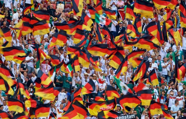 MOSCOW, RUSSIA - Sunday, June 17, 2018: Germany supporters wave their country's flags during the FIFA World Cup Russia 2018 Group F match between Germany and Mexico at the Luzhniki Stadium. (Pic by David Rawcliffe/Propaganda)