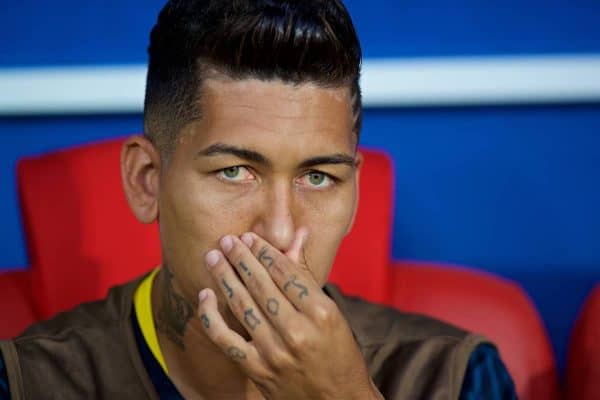 MOSCOW, RUSSIA - Wednesday, June 27, 2018: Brazil's unused substitute Roberto Firmino, with a tattoo 'Love Life' on the fingers of his left hand, on the bench before the FIFA World Cup Russia 2018 Group E match between Serbia and Brazil at the Spartak Stadium. Brazil won 2-0. (Pic by David Rawcliffe/Propaganda)