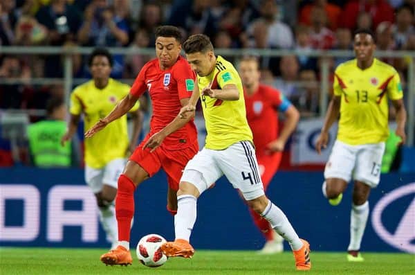 MOSCOW, RUSSIA - Tuesday, July 3, 2018: Colombia's Santiago Arias and England's Jesse Lingard during the FIFA World Cup Russia 2018 Round of 16 match between Colombia and England at the Spartak Stadium. (Pic by David Rawcliffe/Propaganda)