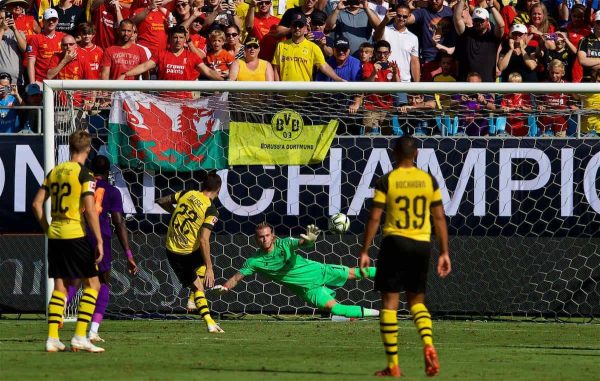 CHARLOTTE, USA - Sunday, July 22, 2018: Liverpool's goalkeeper Loris Karius is beaten by  a penalty by Borussia Dortmund's Christian Pulisic during a preseason International Champions Cup match between Borussia Dortmund and Liverpool FC at the  Bank of America Stadium. Borussia Dortmund won 3-1. (Pic by David Rawcliffe/Propaganda)