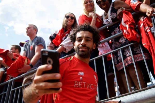 ANN ARBOR, USA - Friday, July 27, 2018: Liverpool's Mohamed Salah takes a selfie with a supporter's iPhone after a training session ahead of the preseason International Champions Cup match between Manchester United FC and Liverpool FC at the Michigan Stadium. (Pic by David Rawcliffe/Propaganda)
