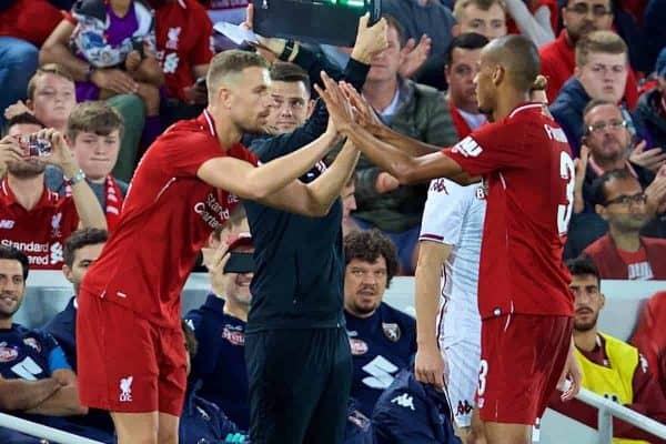 LIVERPOOL, ENGLAND - Tuesday, August 7, 2018: Liverpool's Fabio Henrique Tavares 'Fabinho' is replaced by substitute captain Jordan Henderson during the preseason friendly match between Liverpool FC and Torino FC at Anfield. (Pic by David Rawcliffe/Propaganda)