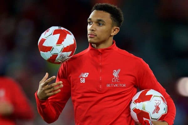 LIVERPOOL, ENGLAND - Tuesday, August 7, 2018: Liverpool's Trent Alexander-Arnold hands out balls and scarves top supporters after the preseason friendly match between Liverpool FC and Torino FC at Anfield. (Pic by David Rawcliffe/Propaganda)