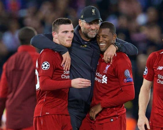 LIVERPOOL, ENGLAND - Tuesday, September 18, 2018: Liverpool's manager Jürgen Klopp (C) celebrates with Andy Robertson (L) and Georginio Wijnaldum (R) after the UEFA Champions League Group C match between Liverpool FC and Paris Saint-Germain at Anfield. Liverpool won 3-2. (Pic by David Rawcliffe/Propaganda)