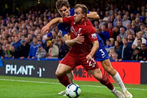 LONDON, ENGLAND - Saturday, September 29, 2018: Chelsea's Marcos Alonso (left) and Liverpool's Xherdan Shaqiri during the FA Premier League match between Chelsea FC and Liverpool FC at Stamford Bridge. (Pic by David Rawcliffe/Propaganda)