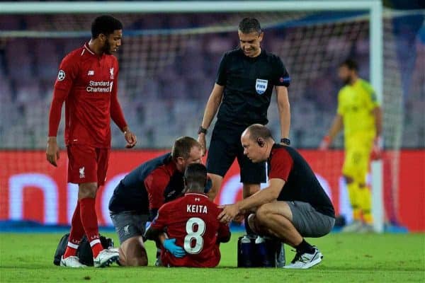 NAPLES, ITALY - Wednesday, October 3, 2018: Liverpool's Naby Keita is treated for a back injury during the UEFA Champions League Group C match between S.S.C. Napoli and Liverpool FC at Stadio San Paolo. (Pic by David Rawcliffe/Propaganda)