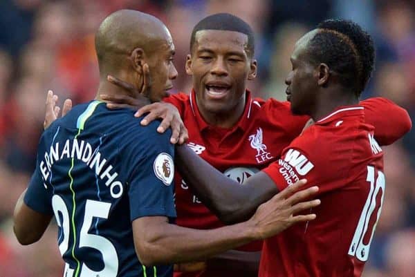 LIVERPOOL, ENGLAND - Sunday, October 7, 2018: Liverpool's Georginio Wijnaldum (C) separates Sadio Mane (R) and Manchester City's Fernando Luiz Roza 'Fernandinho' (L) during the FA Premier League match between Liverpool FC and Manchester City FC at Anfield. (Pic by David Rawcliffe/Propaganda)