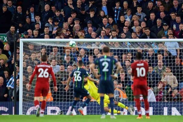 LIVERPOOL, ENGLAND - Sunday, October 7, 2018: Manchester City supporters look on in shock as Riyad Mahrez sends his penalty kick high over the bar and Liverpool's diving goalkeeper Alisson Becker during the FA Premier League match between Liverpool FC and Manchester City FC at Anfield. (Pic by David Rawcliffe/Propaganda)