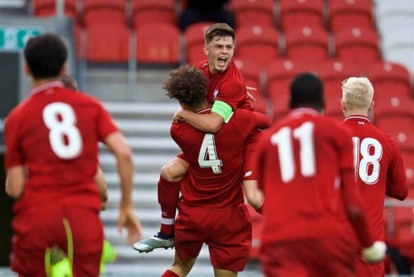 ST HELENS, ENGLAND - Wednesday, October 24, 2018: Liverpool's Rhys Williams celebrates scoring the winning second goal with team-mate captain Adam Lewis during the UEFA Youth League Group C match between Liverpool FC and FK Crvena zvezda at Langtree Park. Liverpool's won 2-1. (Pic by David Rawcliffe/Propaganda)