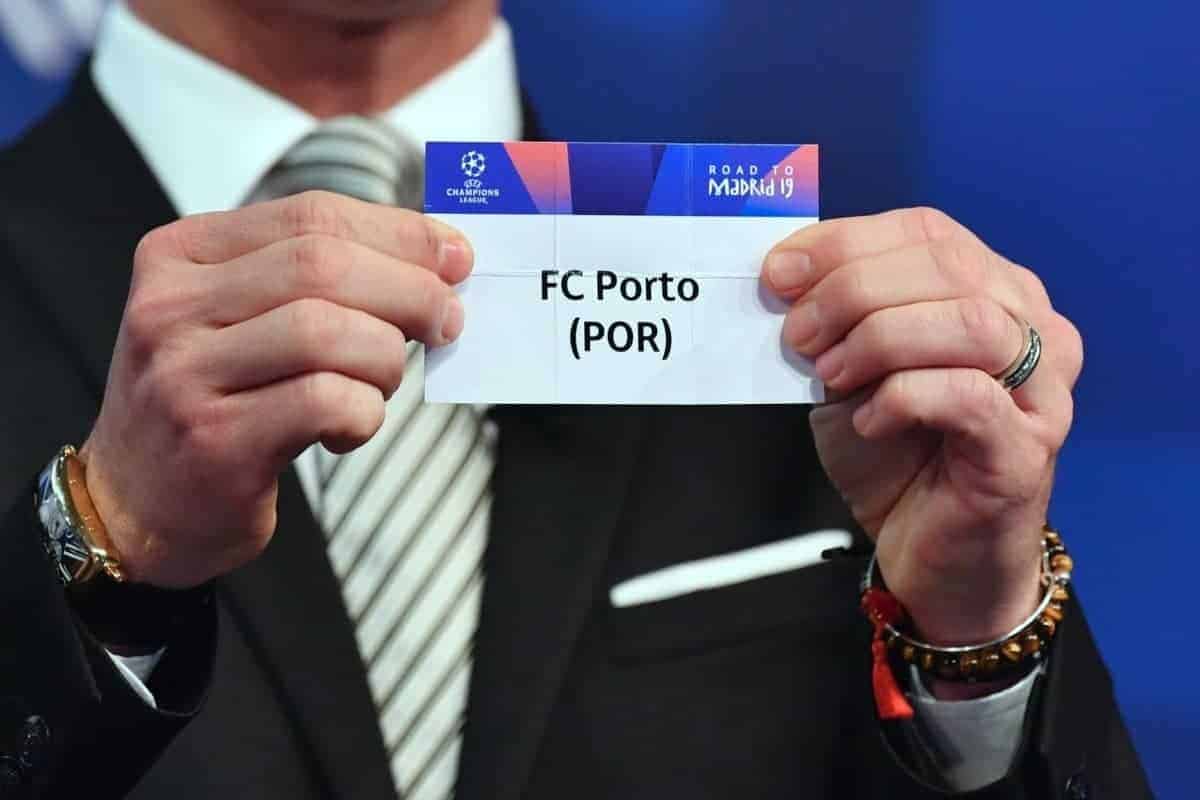 NYON, SWITZERLAND - Monday, December 17, 2018: Former Liverpool player and Champions League winner Luis Garcia holds up FC Porto after making the draw during the UEFA Champions League 2018/19 Round of 16 draw at the UEFA House of European Football. (Handout by UEFA)