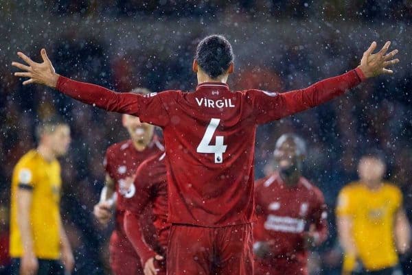 WOLVERHAMPTON, ENGLAND - Friday, December 21, 2018: Liverpool's Virgil van Dijk celebrates the first goal scored by Mohamed Salah (hidden) during the FA Premier League match between Wolverhampton Wanderers FC and Liverpool FC at Molineux Stadium. (Pic by David Rawcliffe/Propaganda)