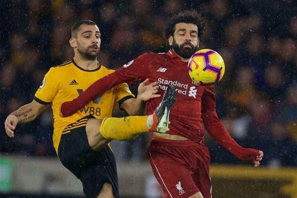 WOLVERHAMPTON, ENGLAND - Friday, December 21, 2018: Liverpool's Mohamed Salah is challenged by Wolverhampton Wanderers' Jonny Castro (L) during the FA Premier League match between Wolverhampton Wanderers FC and Liverpool FC at Molineux Stadium. (Pic by David Rawcliffe/Propaganda)