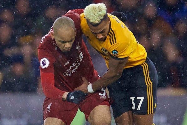 WOLVERHAMPTON, ENGLAND - Friday, December 21, 2018: Liverpool's Fabio Henrique Tavares 'Fabinho' and Wolverhampton Wanderers' Adama Traoré during the FA Premier League match between Wolverhampton Wanderers FC and Liverpool FC at Molineux Stadium. (Pic by David Rawcliffe/Propaganda)