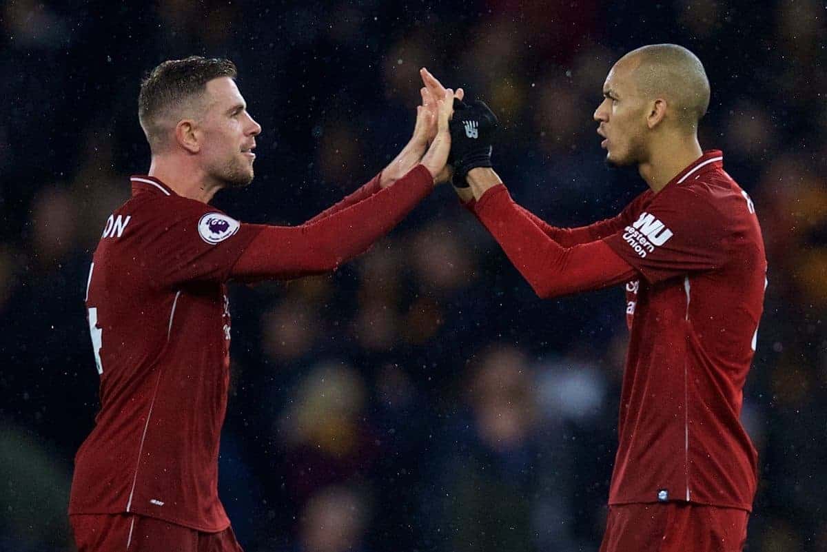 WOLVERHAMPTON, ENGLAND - Friday, December 21, 2018: Liverpool's Dejan Lovren, captain Jordan Henderson and Fabio Henrique Tavares 'Fabinho' celebrate after the 2-0 victory during the FA Premier League match between Wolverhampton Wanderers FC and Liverpool FC at Molineux Stadium. (Pic by David Rawcliffe/Propaganda)