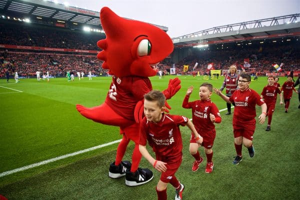 LIVERPOOL, ENGLAND - Saturday, January 19, 2019: Liverpool's Mighty Red gives a young mascot a high-five before the FA Premier League match between Liverpool FC and Crystal Palace FC at Anfield. (Pic by David Rawcliffe/Propaganda)