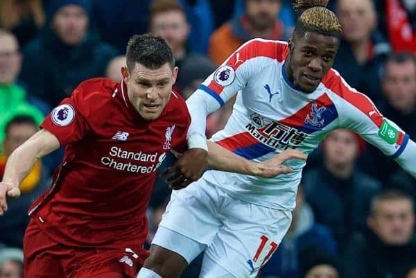 LIVERPOOL, ENGLAND - Saturday, January 19, 2019: Liverpool's James Milner (L) and Crystal Palace's Wilfried Zaha during the FA Premier League match between Liverpool FC and Crystal Palace FC at Anfield. (Pic by David Rawcliffe/Propaganda)