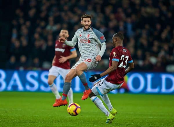 LONDON, ENGLAND - Monday, February 4, 2019: Liverpool's Adam Lallana and West Ham United's Issa Diop during the FA Premier League match between West Ham United FC and Liverpool FC at the London Stadium. (Pic by David Rawcliffe/Propaganda)