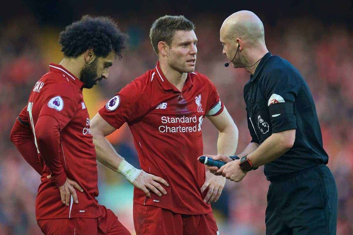 LIVERPOOL, ENGLAND - Saturday, February 9, 2019: Liverpool's Mohamed Salah (L) and captain James Milner (C) are spoken to by referee Anthony Taylor during the FA Premier League match between Liverpool FC and AFC Bournemouth at Anfield. (Pic by David Rawcliffe/Propaganda)