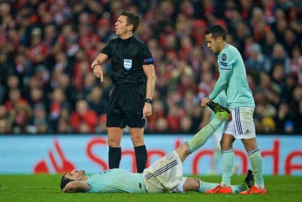 LIVERPOOL, ENGLAND - Tuesday, February 19, 2019: FC Bayern Munich's Javi Martínez lies injured as referee Gianluca Rocchi looks on during the UEFA Champions League Round of 16 1st Leg match between Liverpool FC and FC Bayern München at Anfield. (Pic by David Rawcliffe/Propaganda)