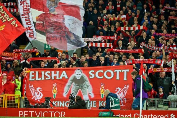 LIVERPOOL, ENGLAND - Wednesday, February 27, 2019: Liverpool supporters on the Spion Kop with a banner featuring former goalkeeper Elisha Scott before the FA Premier League match between Liverpool FC and Watford FC at Anfield. (Pic by Paul Greenwood/Propaganda)