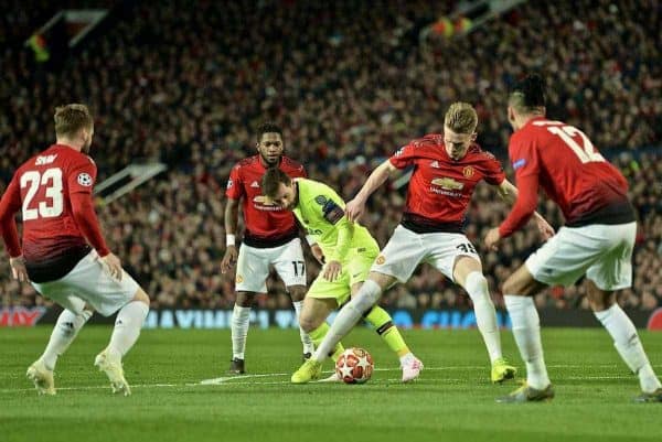 MANCHESTER, ENGLAND - Thursday, April 11, 2019: Barcelona's captain Lionel Messi is tackled by Manchester United's Scott McTominay during the UEFA Champions League Quarter-Final 1st Leg match between Manchester United FC and FC Barcelona at Old Trafford. Barcelona won 1-0. (Pic by David Rawcliffe/Propaganda)